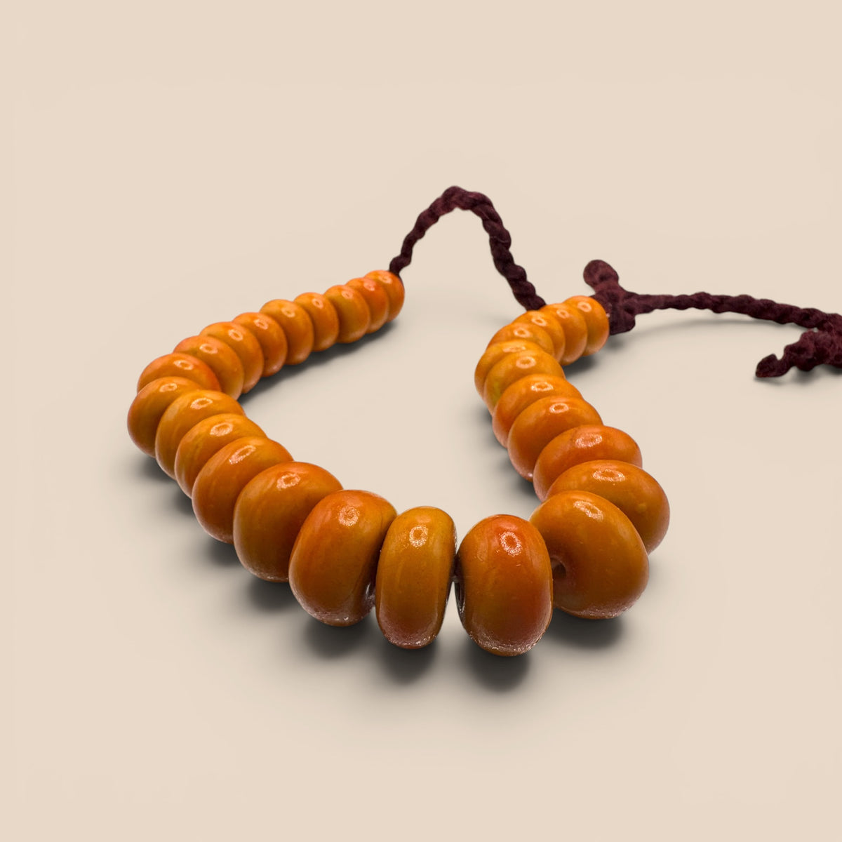 Collier perles ambre disques