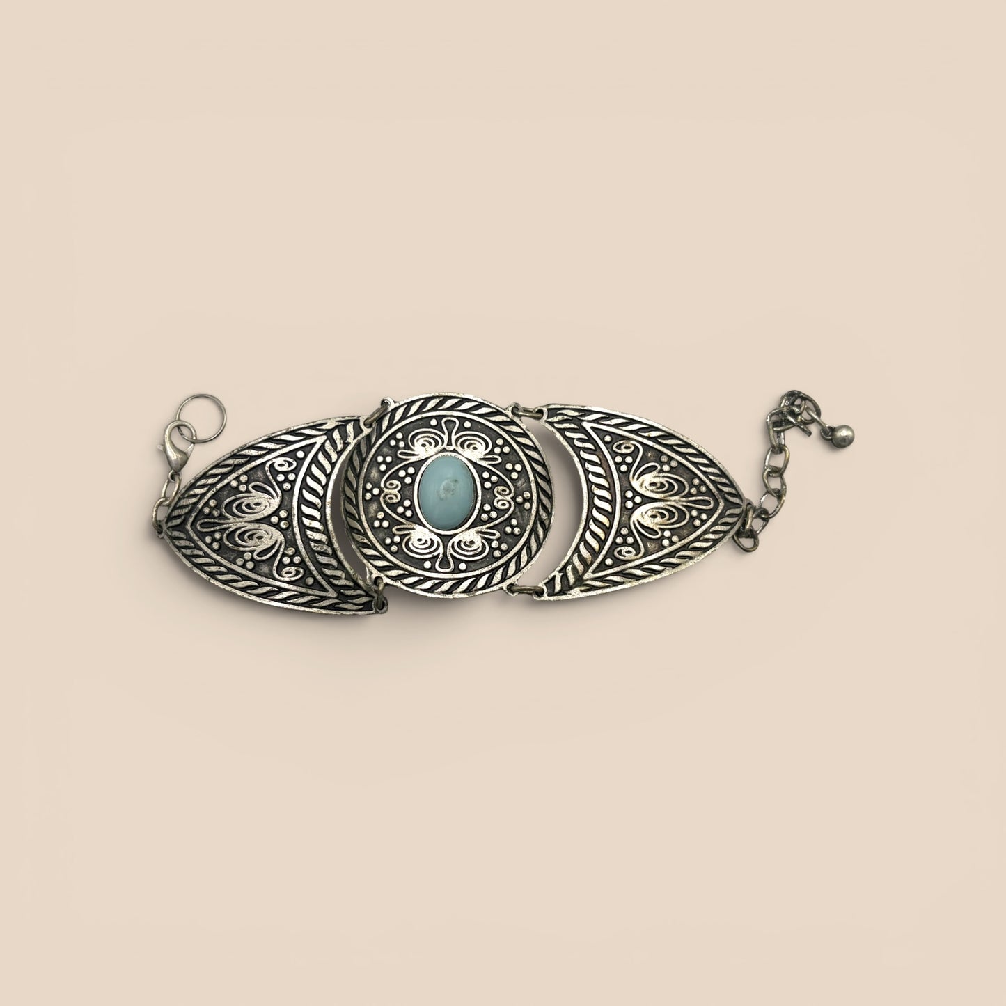 Broche ovale argenté cabochon turquoise